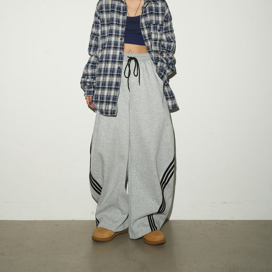 Three-Stripe Curved Wide Leg Sweat Pants NA9130
